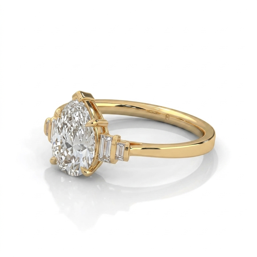 Pear Cut Diamond Engagement Ring in Solid Gold with Baguette Side Stones