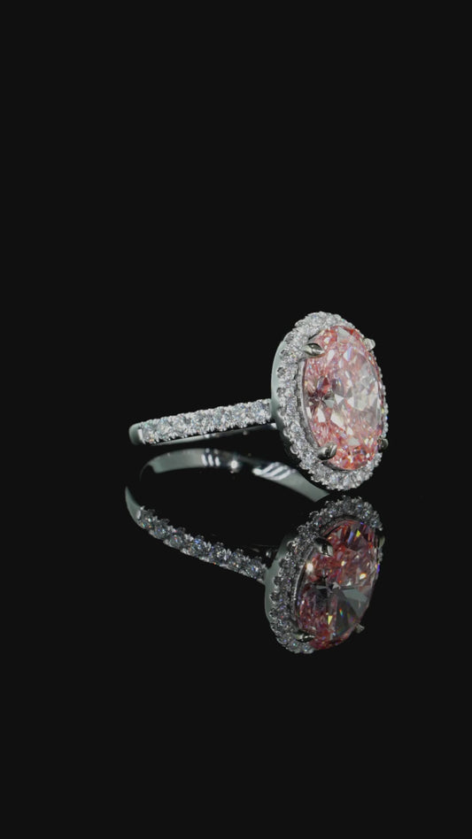 Pink oval diamond engagement ring
