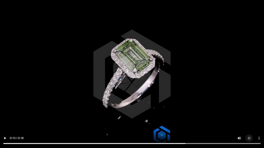 Emerald-cut green diamond halo ring