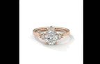 Pear Cut Diamond Engagement Ring in Solid Gold with Baguette Side Stones